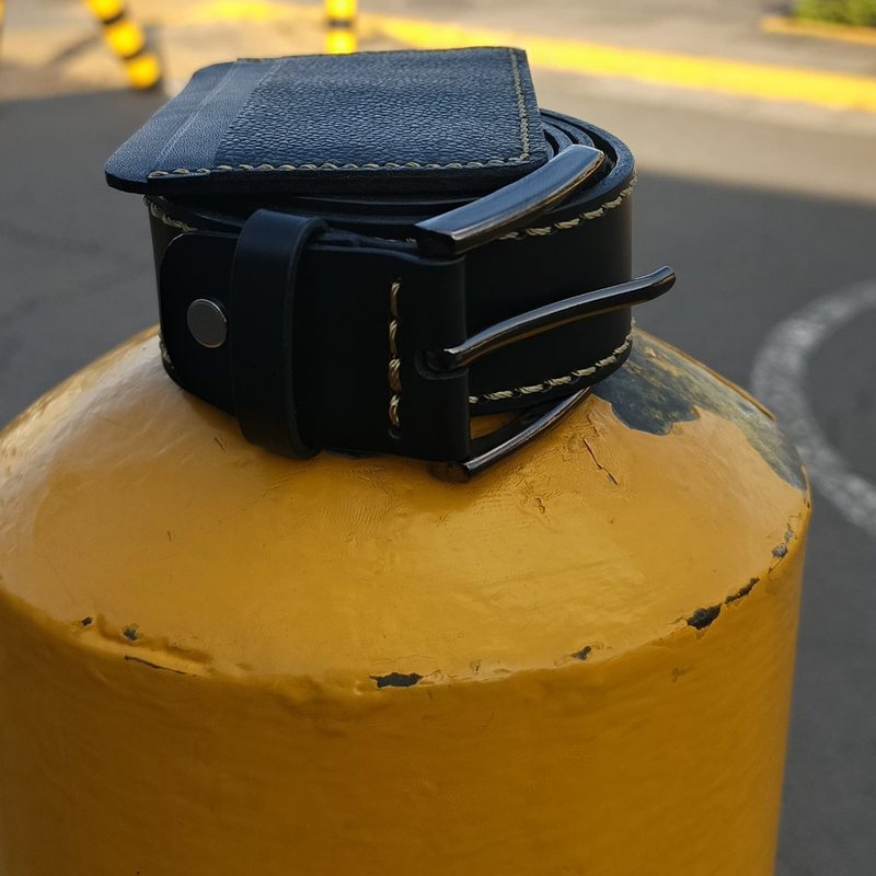 Black leather belt with cream stitching and a wallet