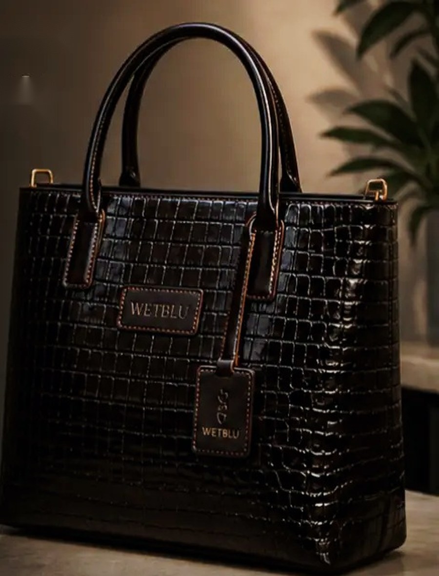 LÈ-KIONDO black croc-embossed leather tote with WetBlu patch