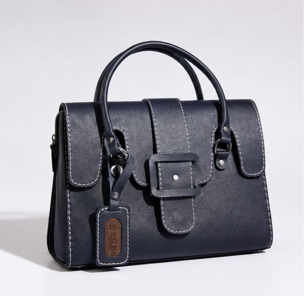 DADA navy structured leather handbag with buckle and white stitching